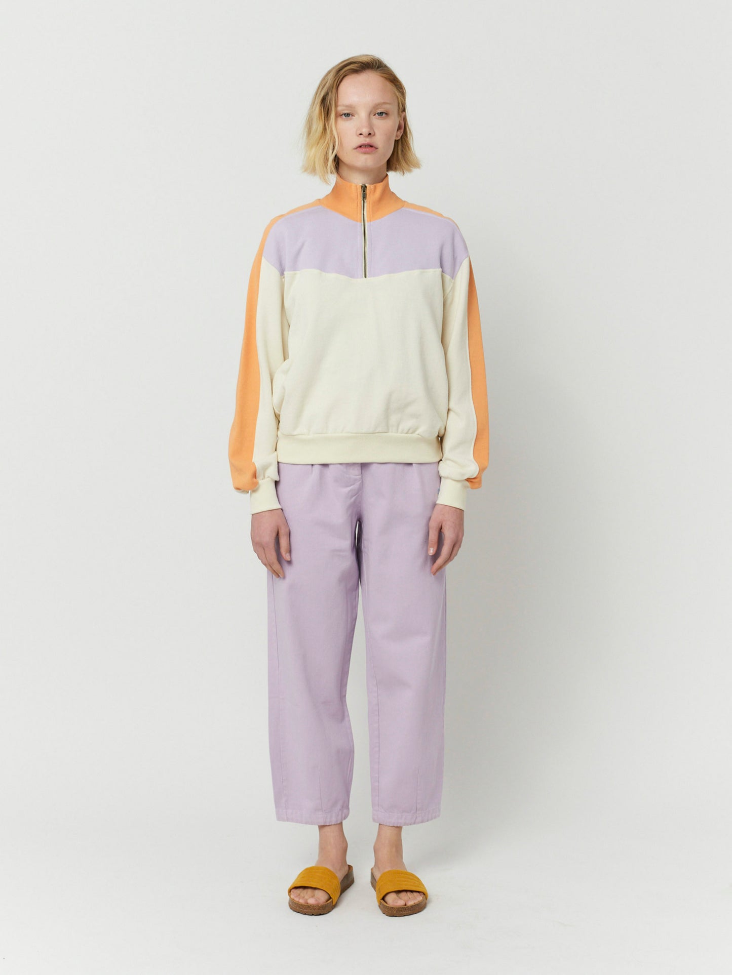 Dessuadora amb cremallera i blocs de color