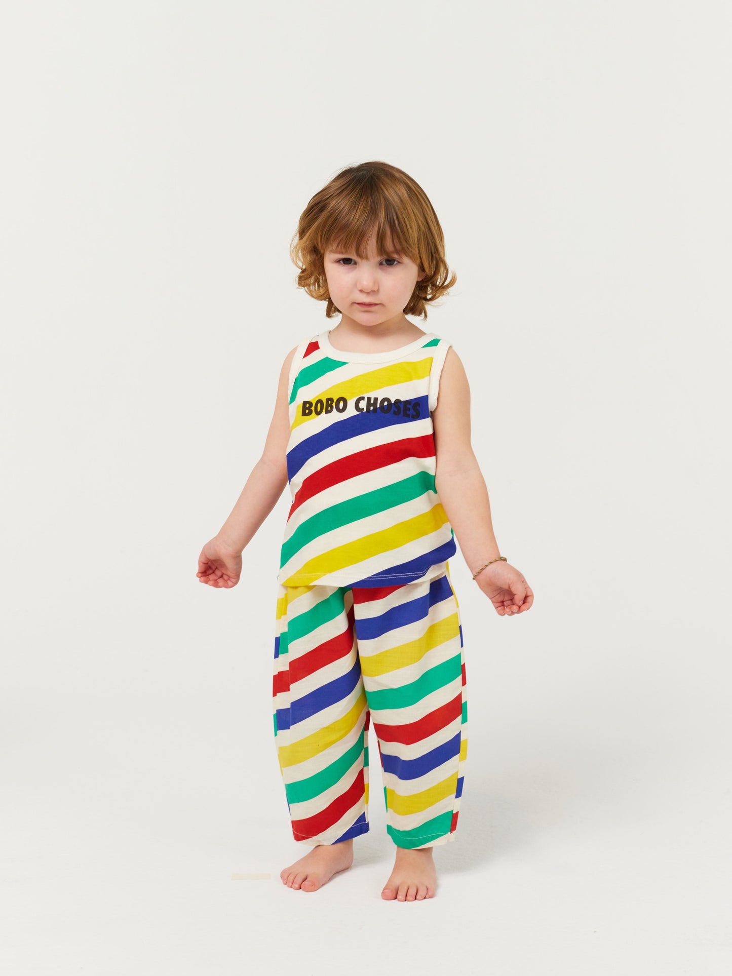 Happy stripes all over baggy trousers