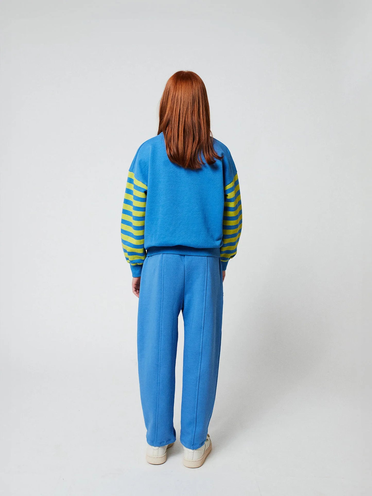 Smiling blue jogging pants