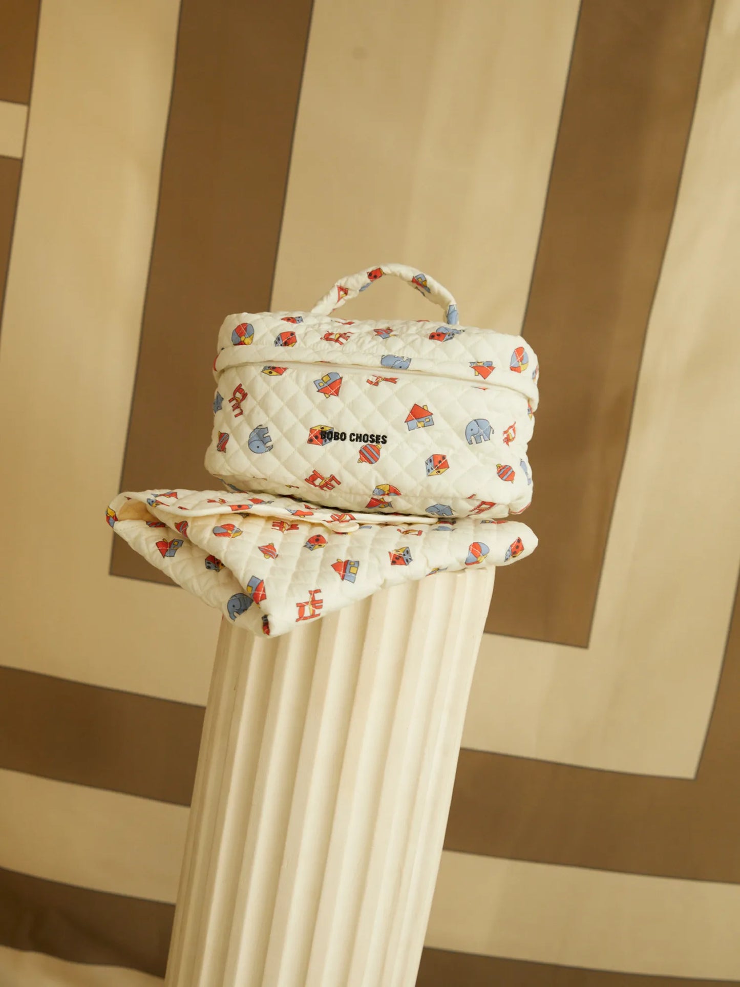 Toys all over quilted pouch