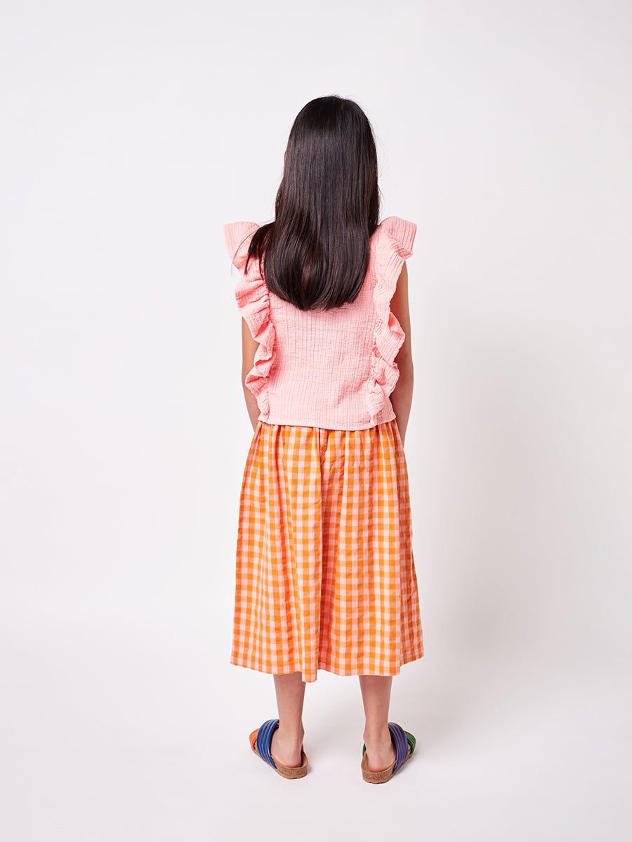 Triangular woven ruffle top