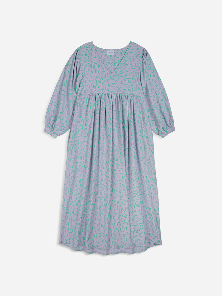 Vestit llarg amb coll en punta serpentines