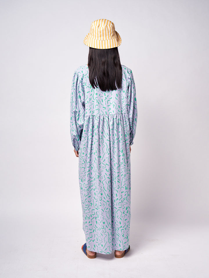 Vestit llarg amb coll en punta serpentines