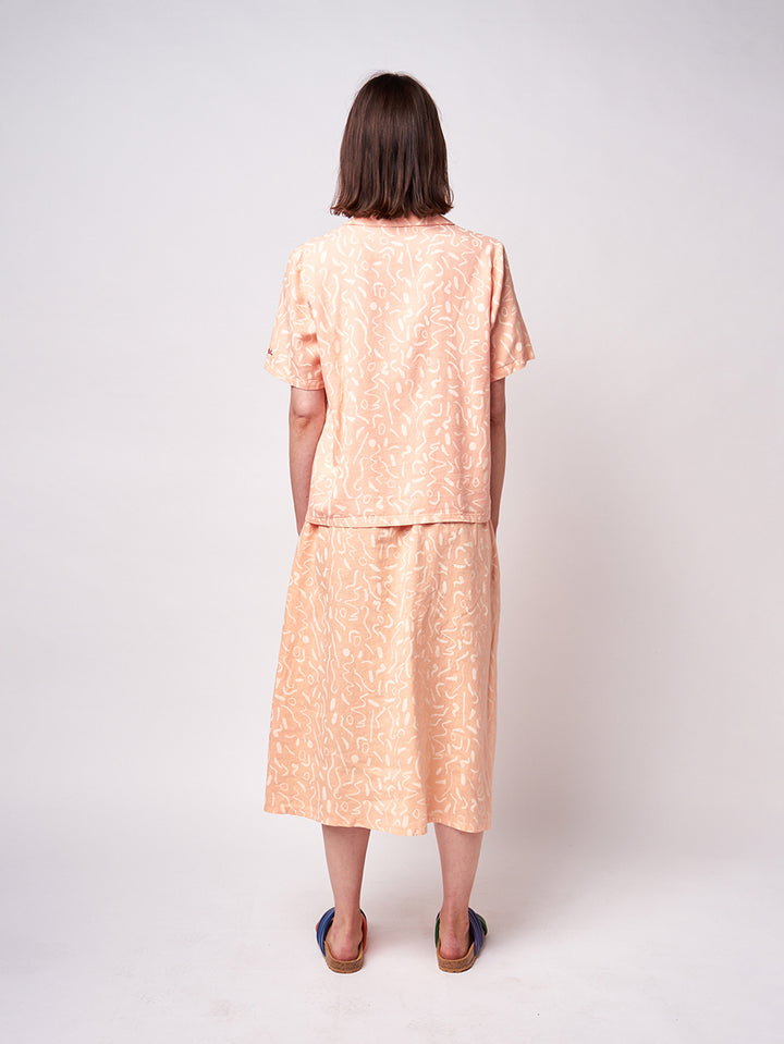 Faldilla de llarg mig serpentines