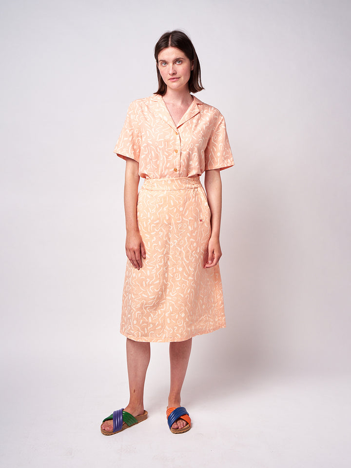 Faldilla de llarg mig serpentines