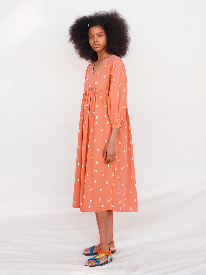 Maxivestit amb coll en punta Beauty is Everywhere