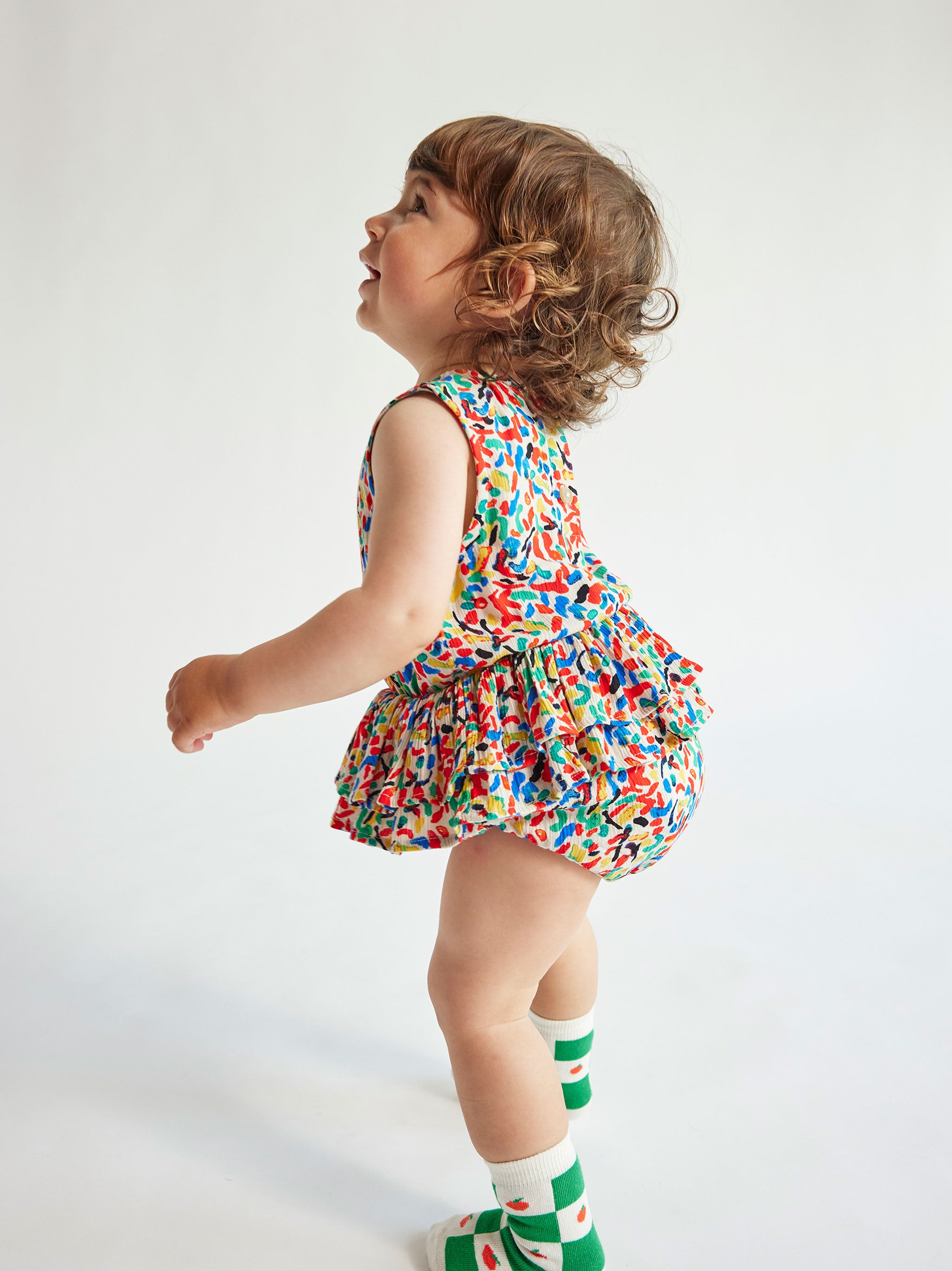 Confetti all over ruffle woven romper