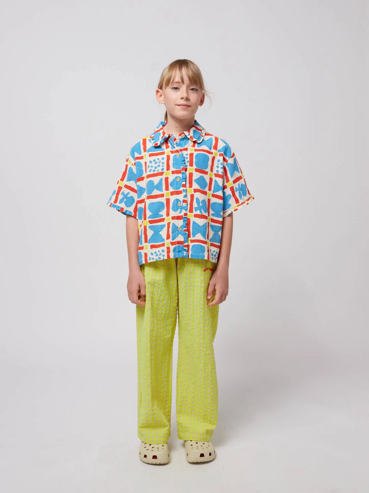 Smiling yellow jogging pants