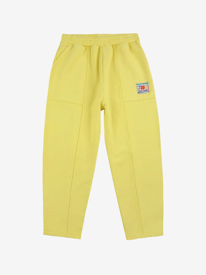 Smiling yellow jogging pants