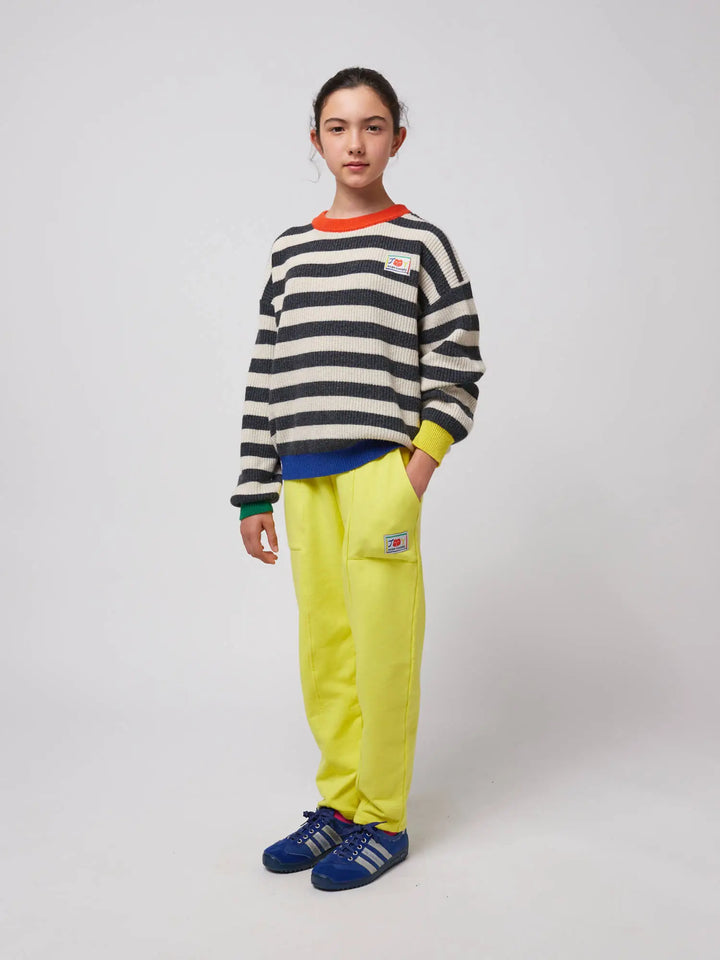 Smiling yellow jogging pants