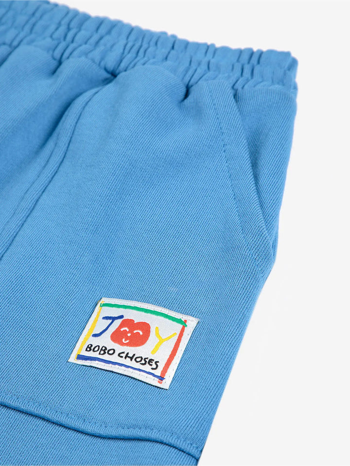Smiling blue jogging pants