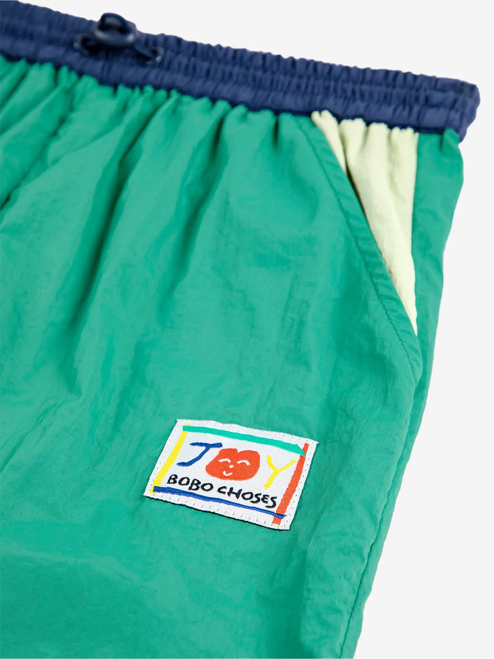 Smiling color block tracksuit pants