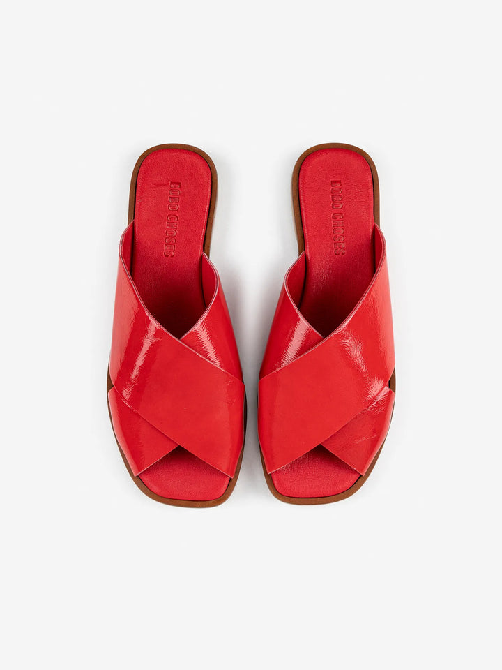 Red patent-leather cross sandal