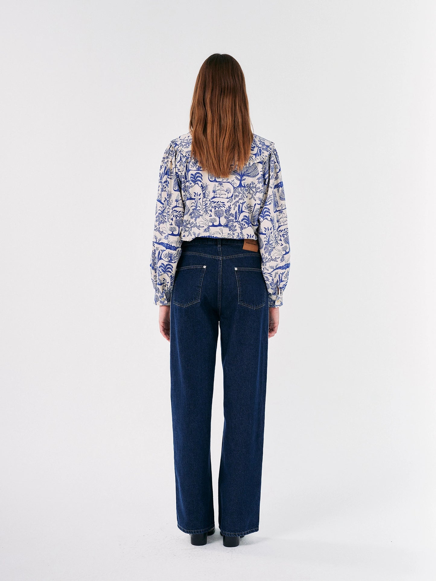 Embroidered denim pleated jeans