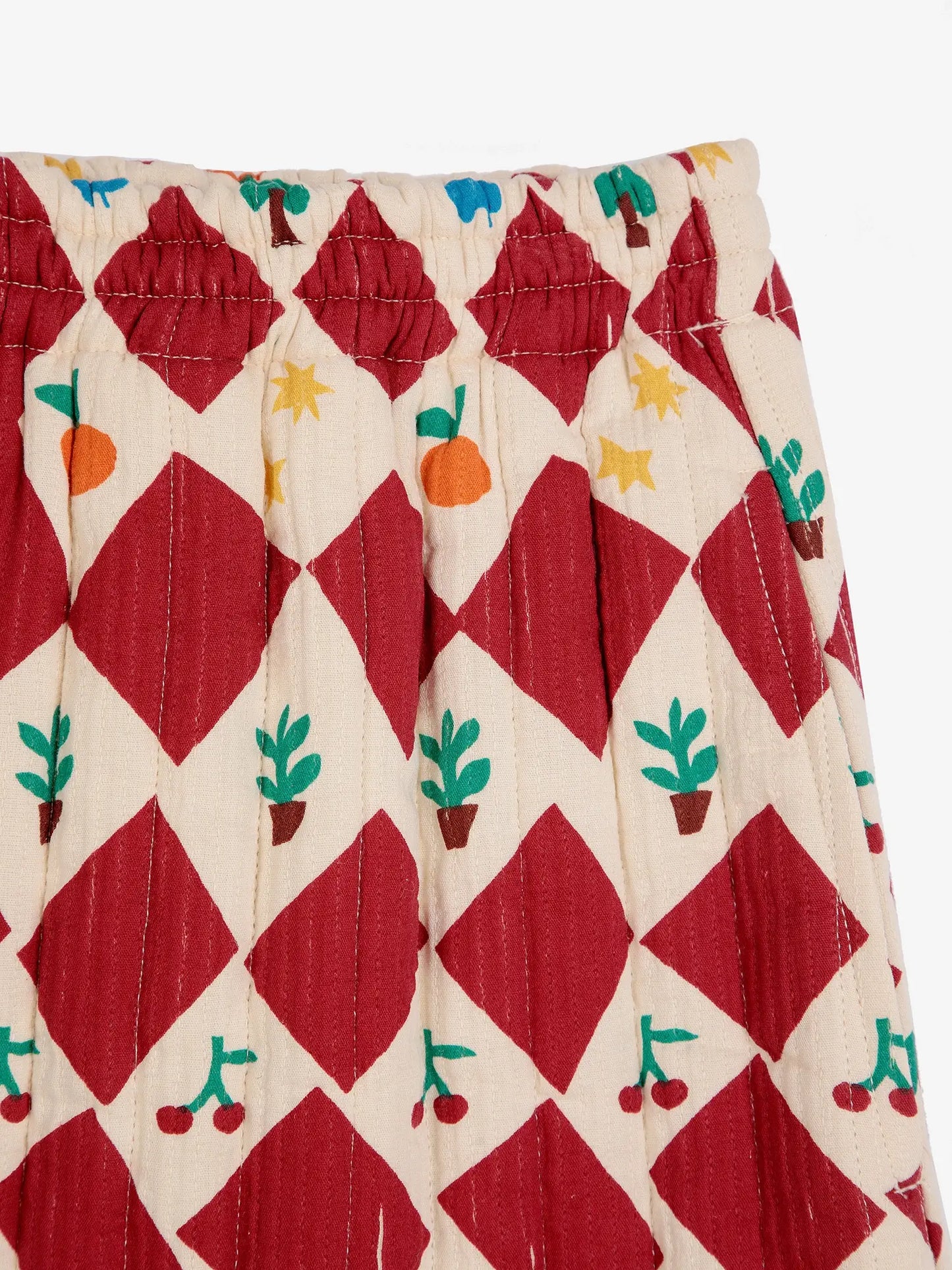 Harlequin printed quilted mini skirt