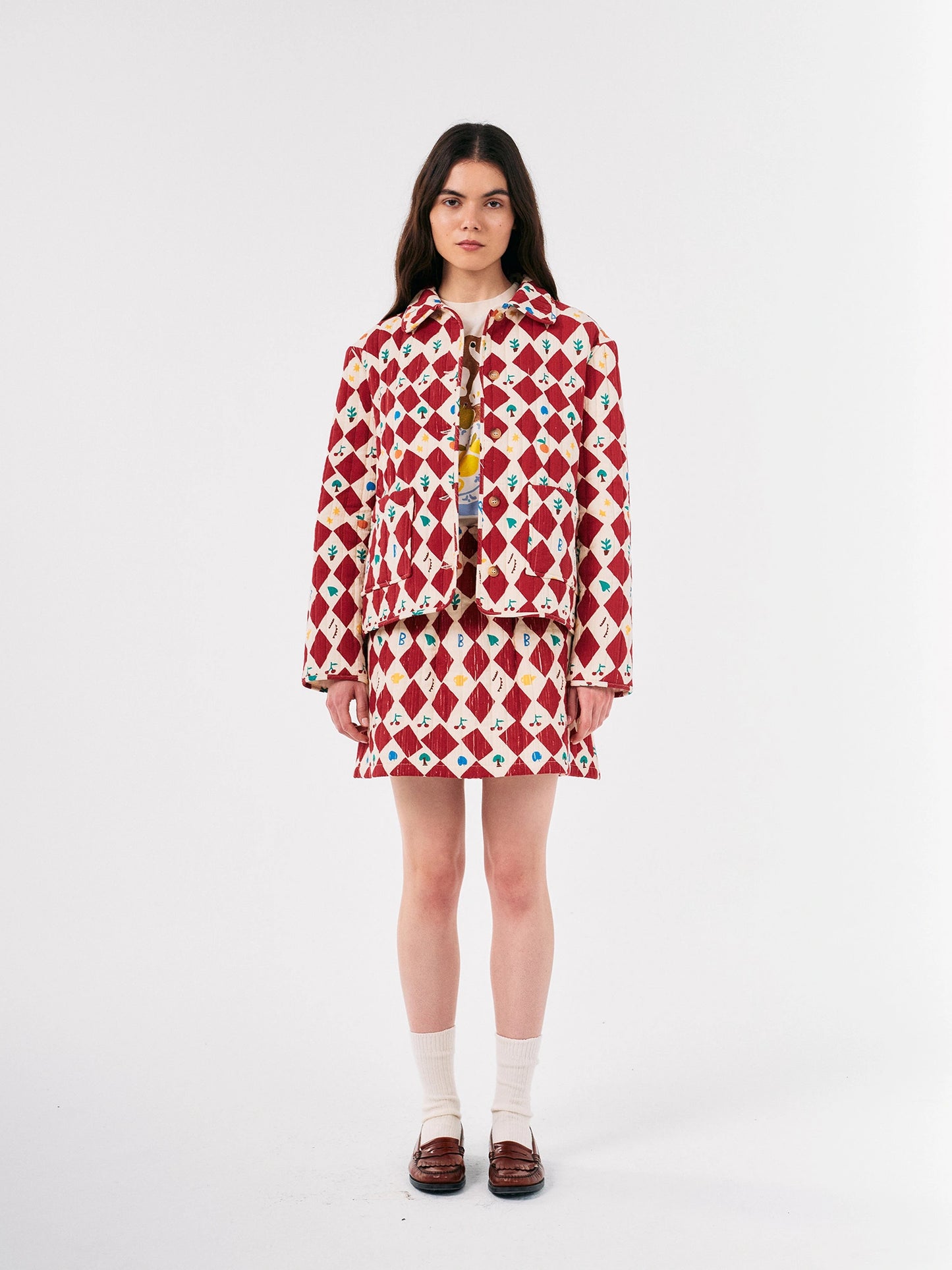 Harlequin printed quilted cropped jacket