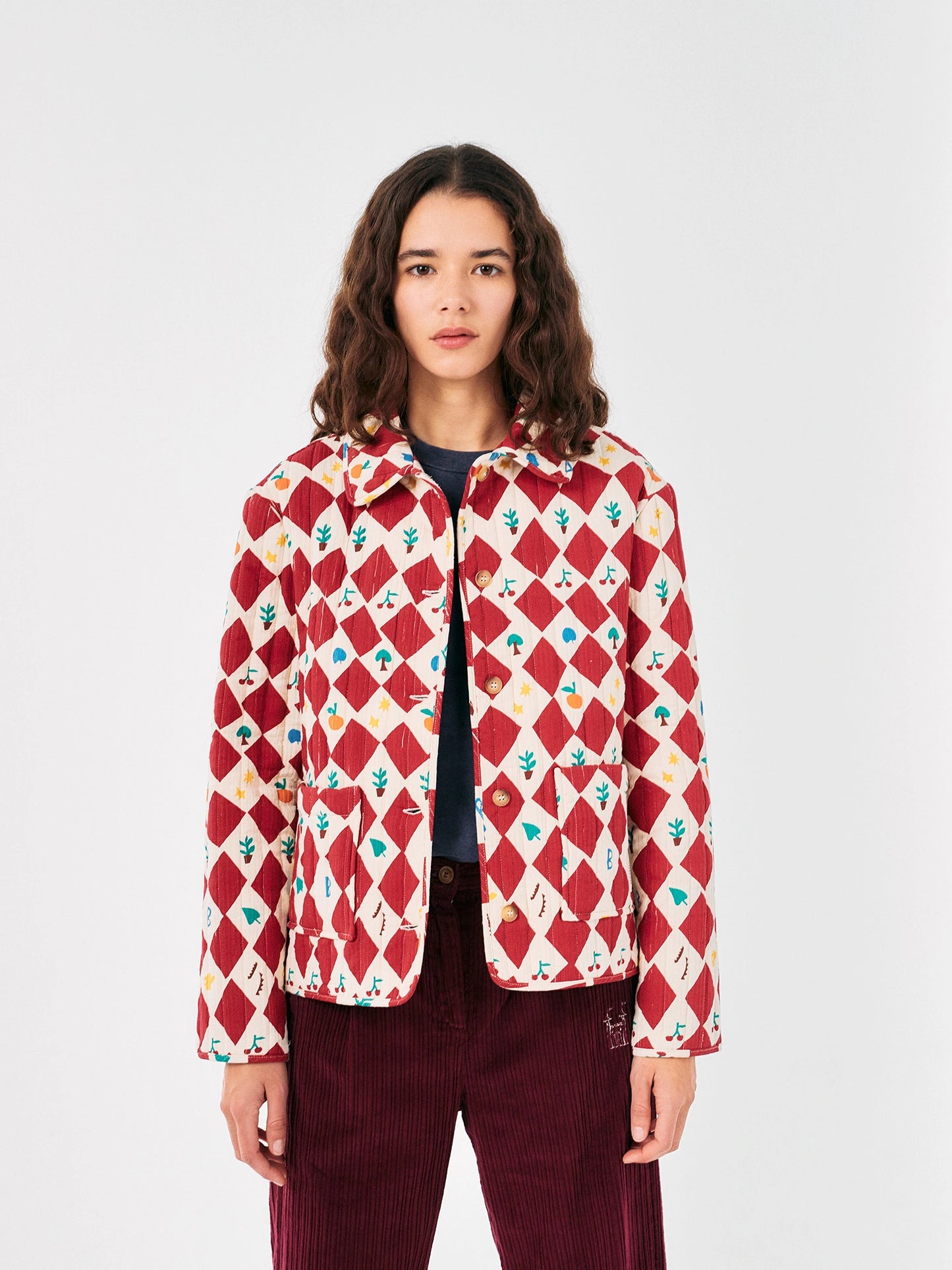 Harlequin printed quilted cropped jacket