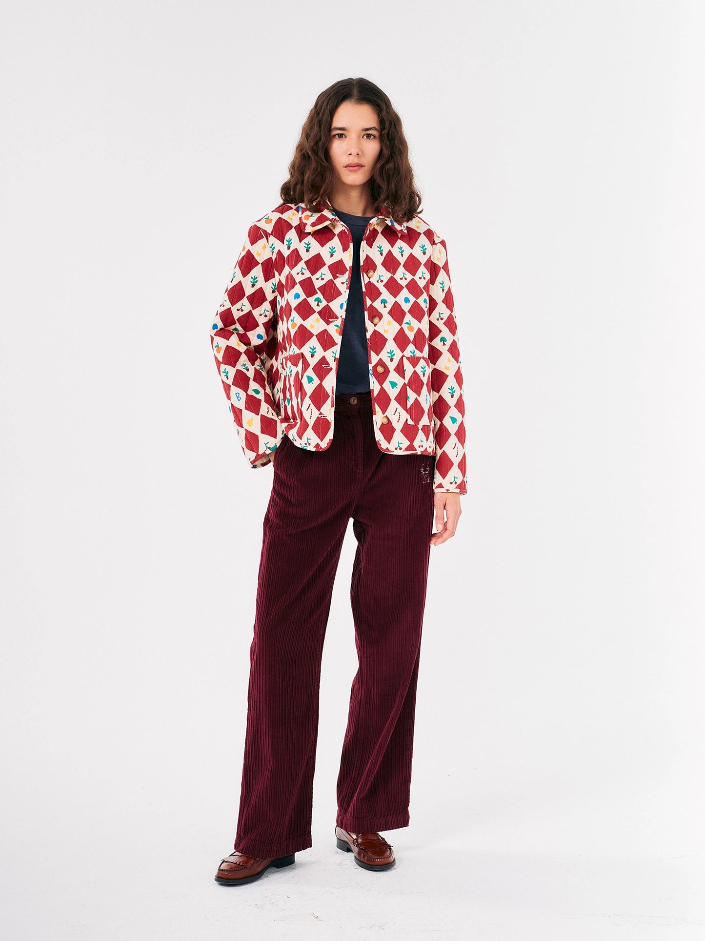 Harlequin printed quilted cropped jacket