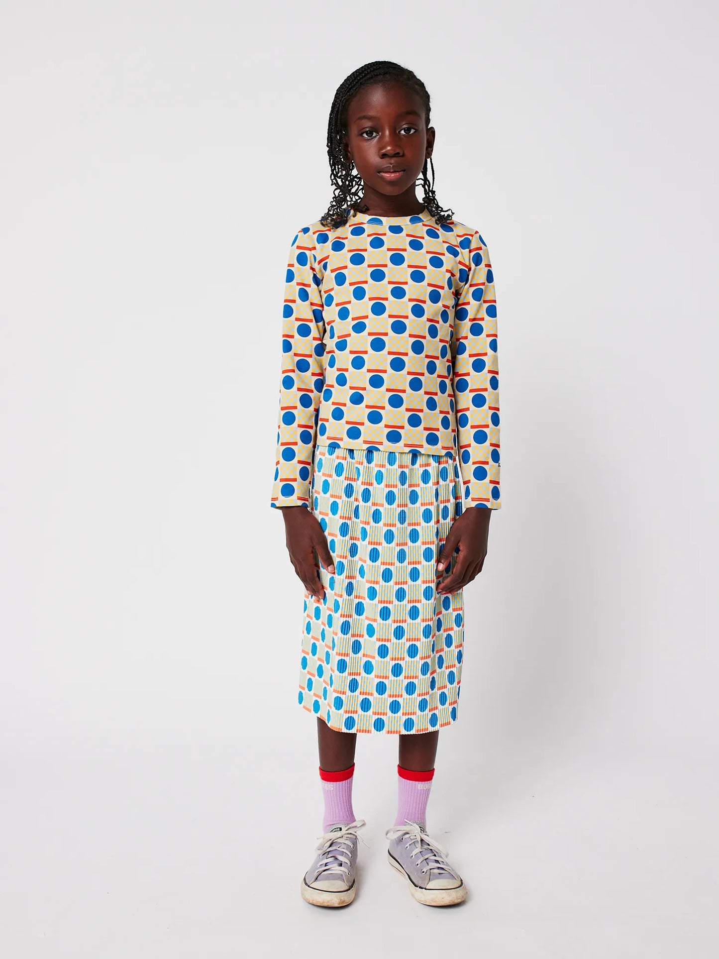 Geometric Scacs over pencil pleated skirt