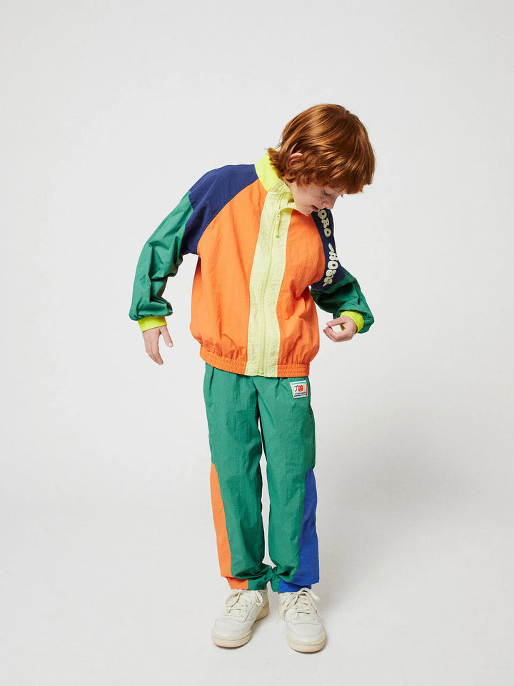 Smiling color block tracksuit pants