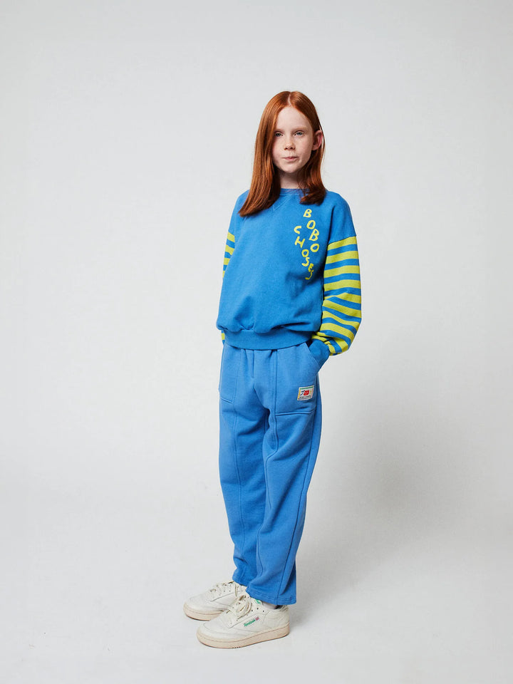 Smiling blue jogging pants