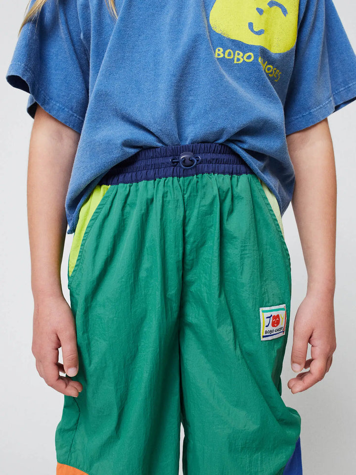 Smiling color block tracksuit pants