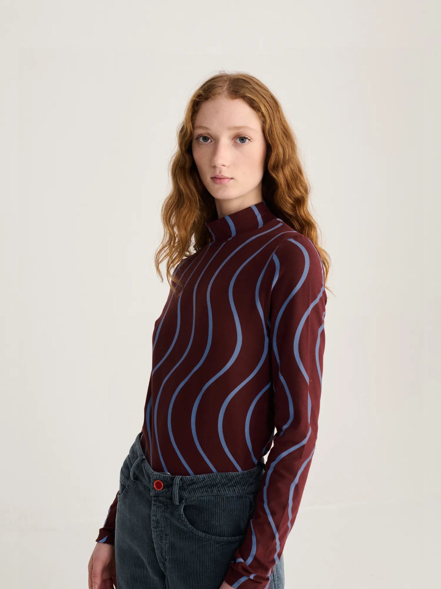 Psicodelic stripes all over turtleneck top