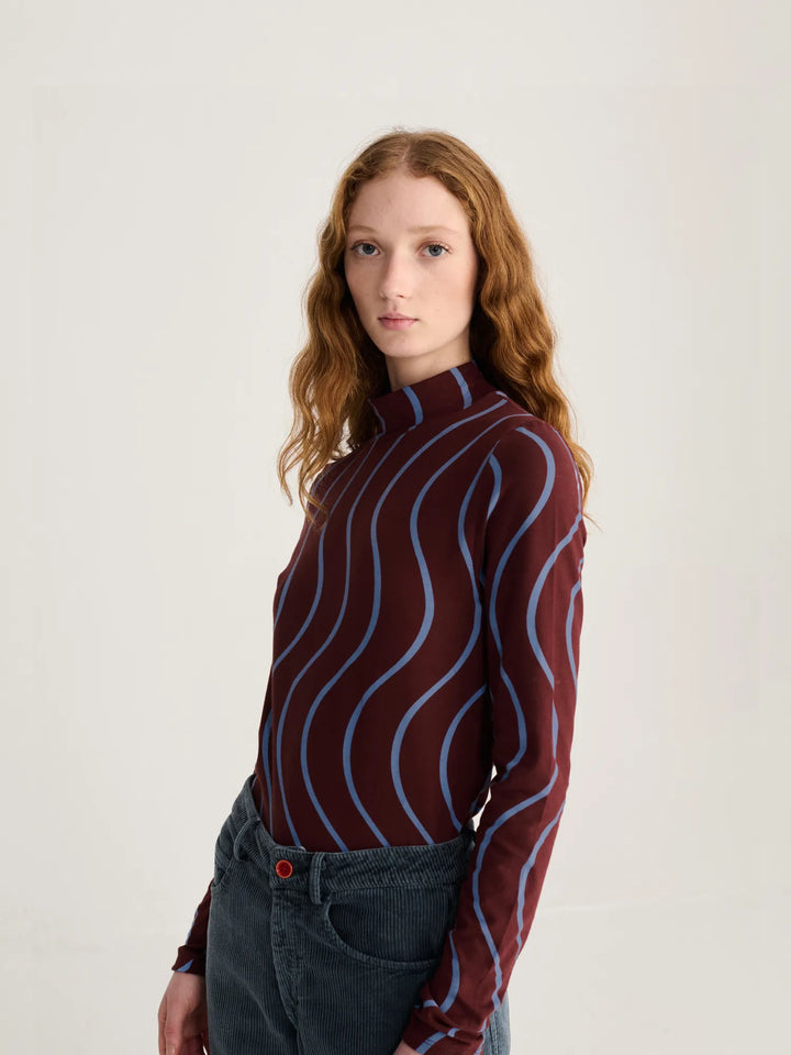 Psicodelic stripes all over turtleneck top