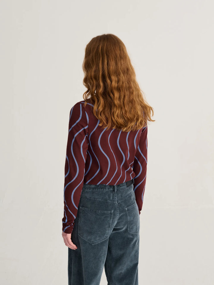 Psicodelic stripes all over turtleneck top