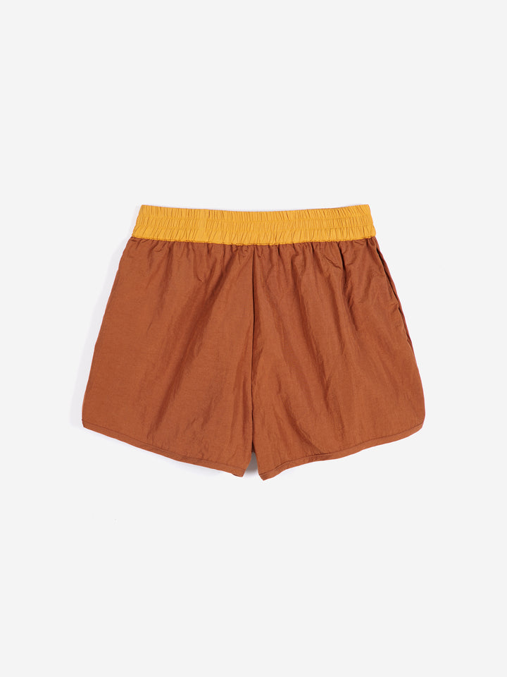 Shiny color block nylon shorts