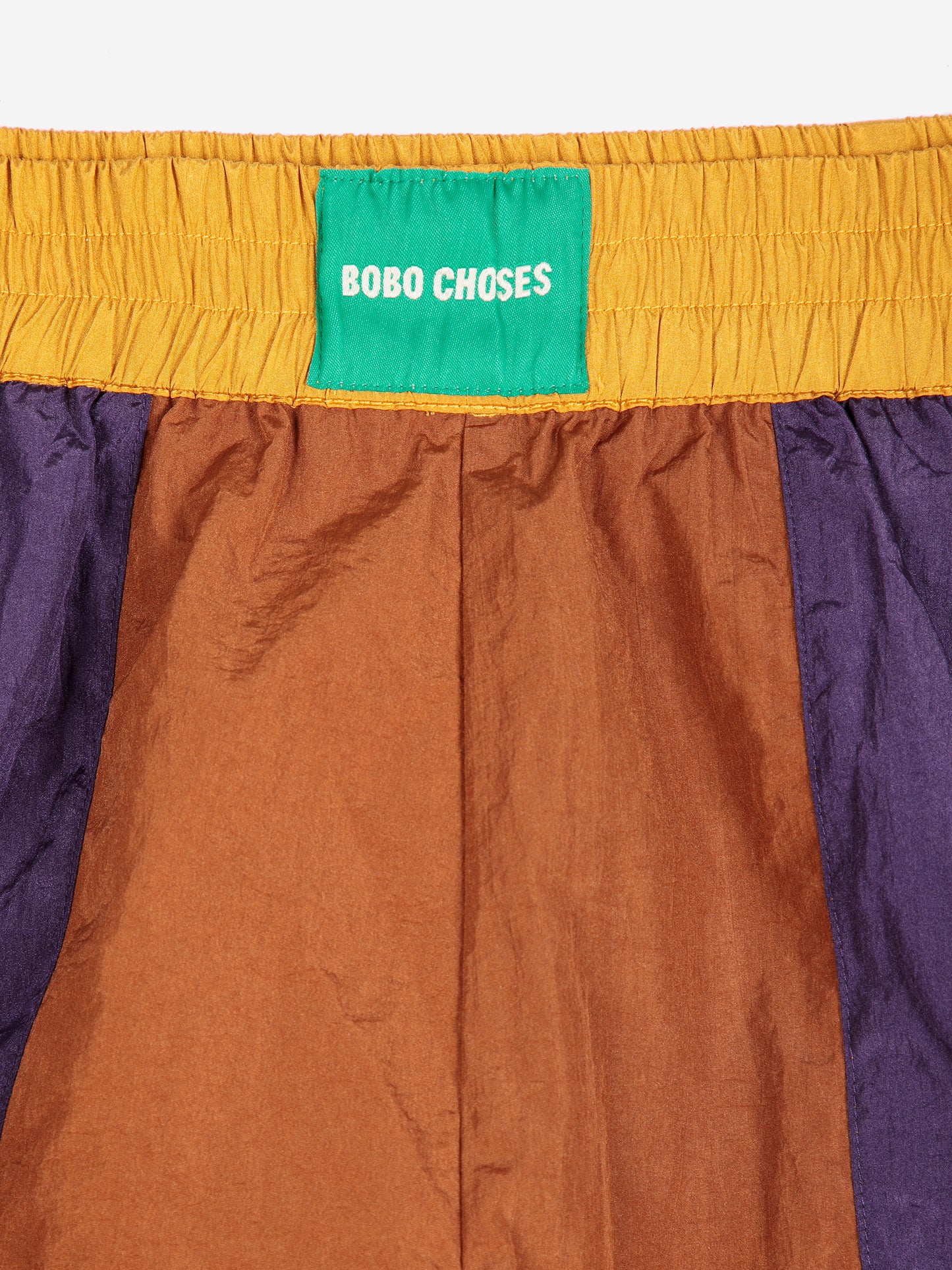 Shiny color block nylon shorts