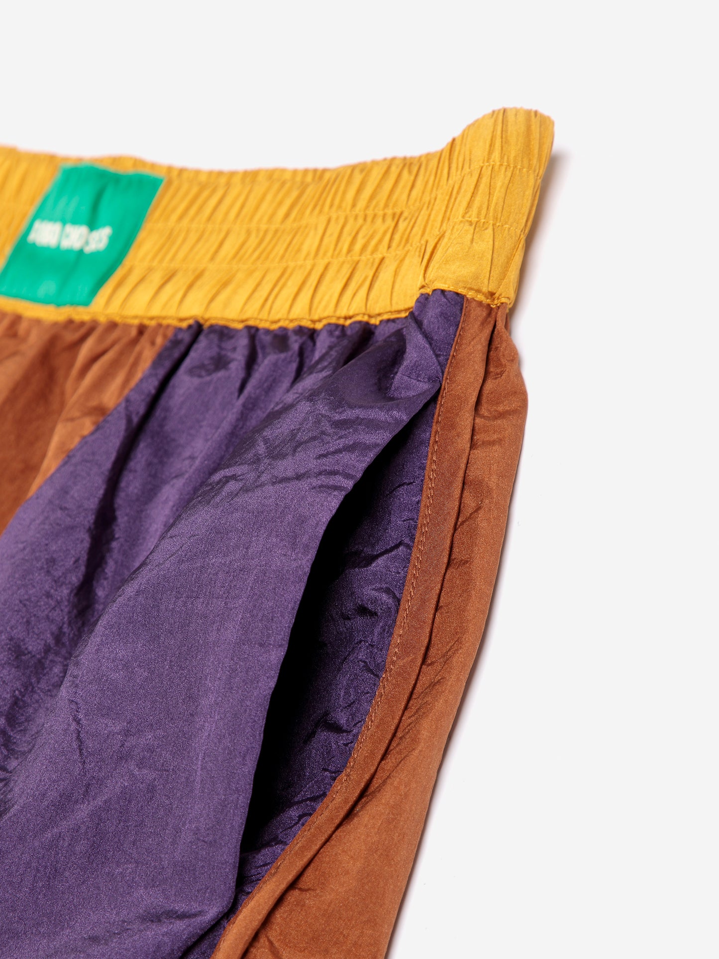Shiny color block nylon shorts