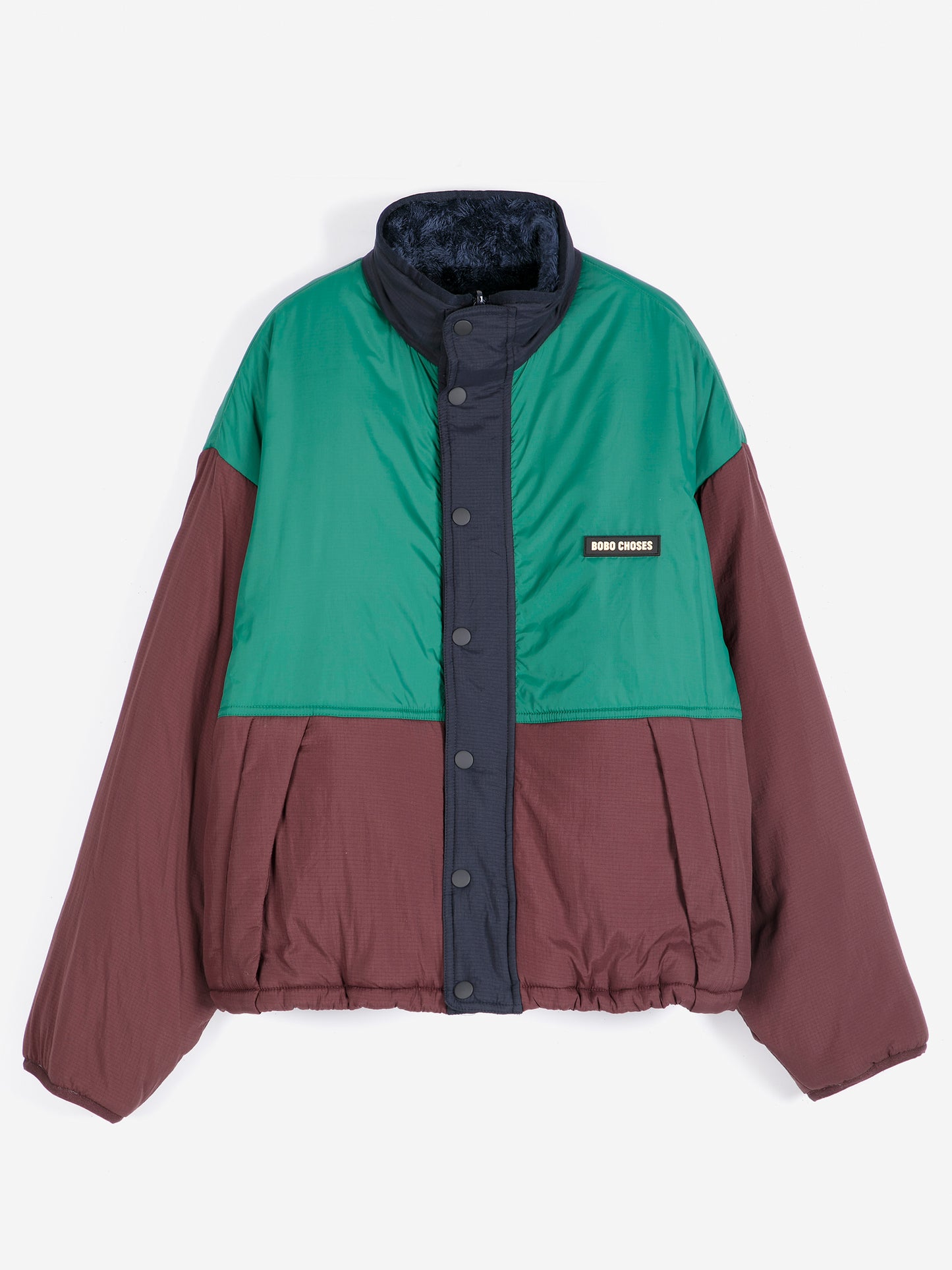 Reversible nylon cozy sherpa