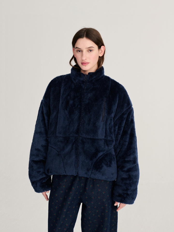 Reversible nylon cozy sherpa