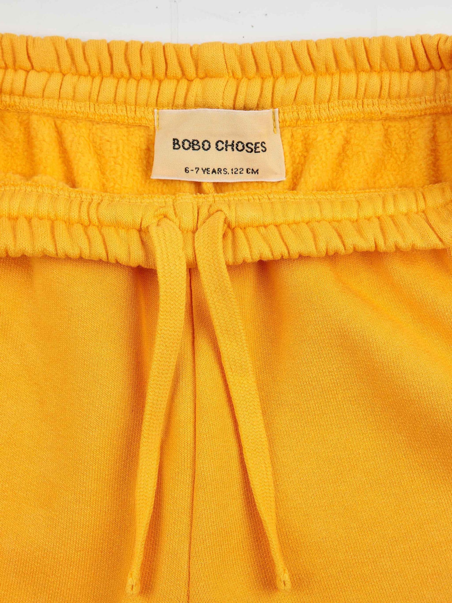 Pantalons esportius grocs Bobo Choses