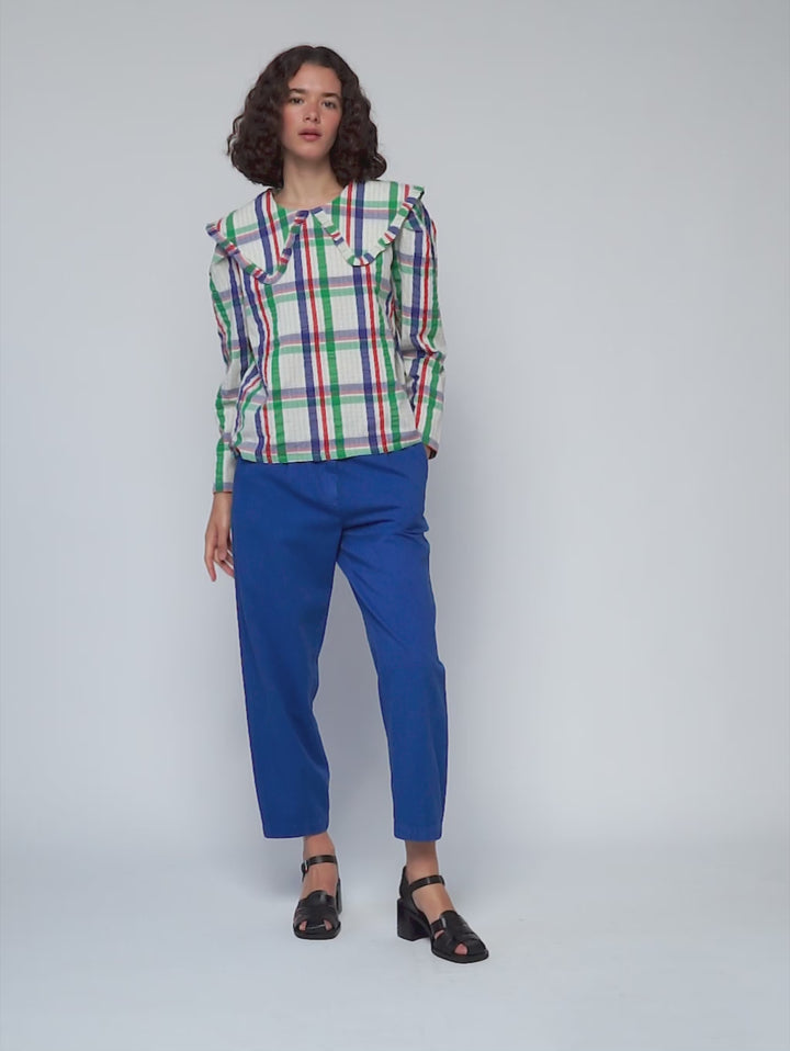 Brusa de quadres amb coll