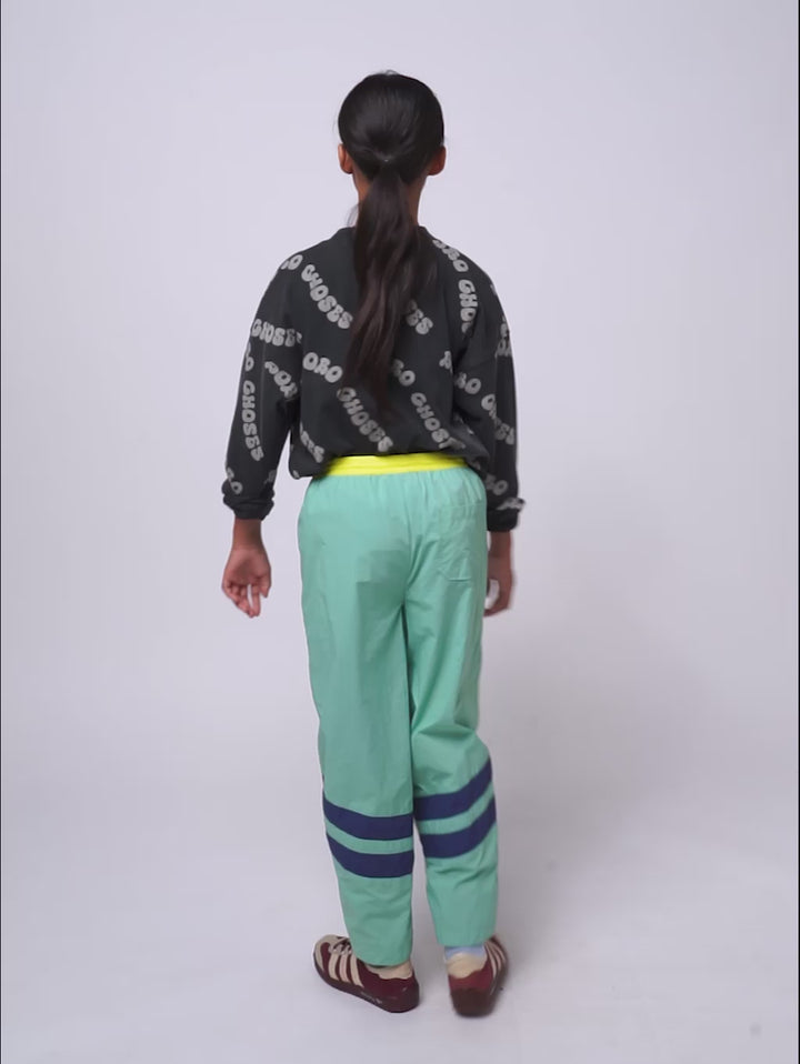 Smiling color block tracksuit pants
