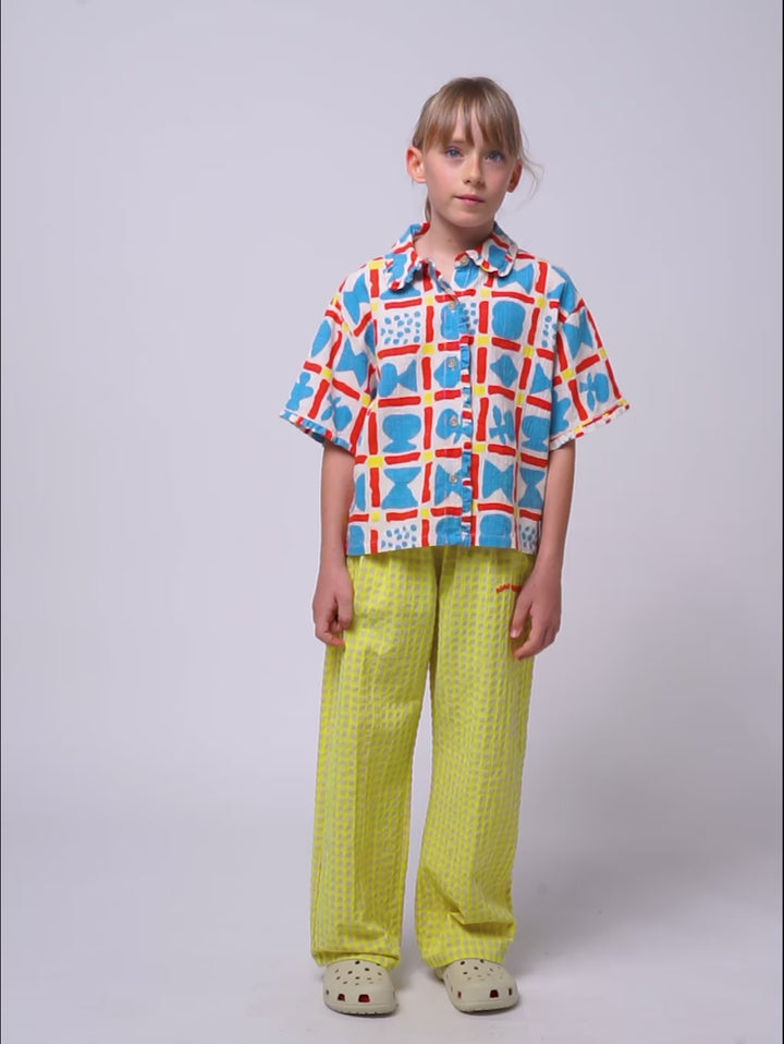 Smiling yellow jogging pants