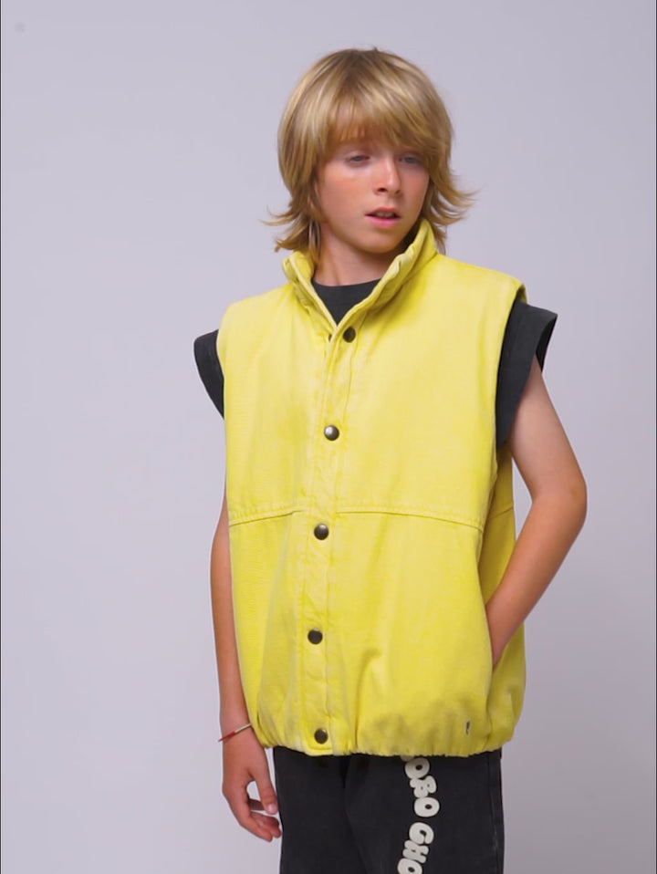 Smiling denim vest