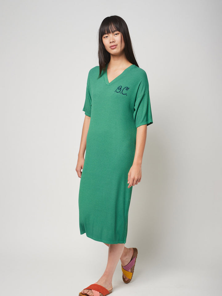 Vestit túnica de punt elàstic amb coll en punta