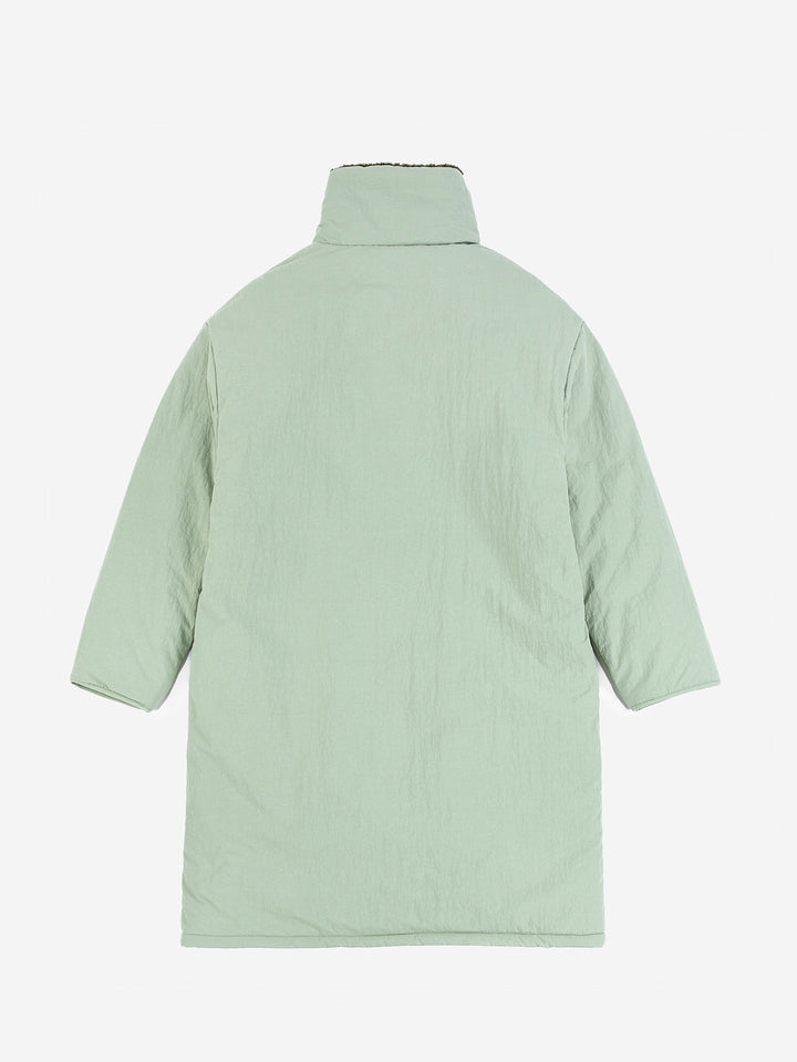 Parca reversible encoixinada amb cremallera i blocs de color