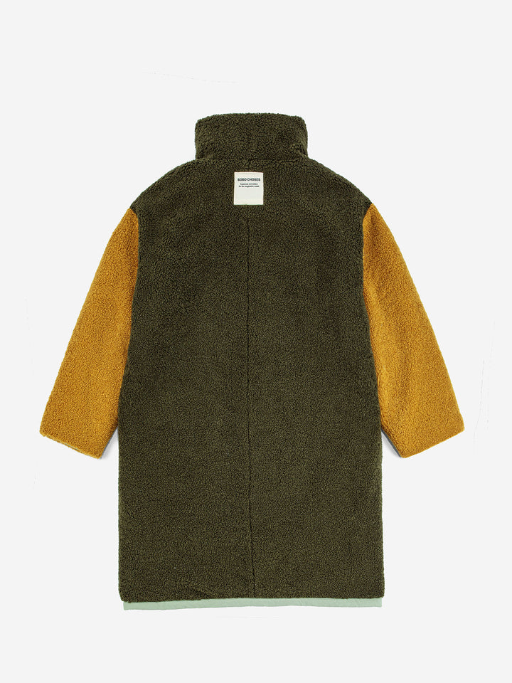 Parca reversible encoixinada amb cremallera i blocs de color